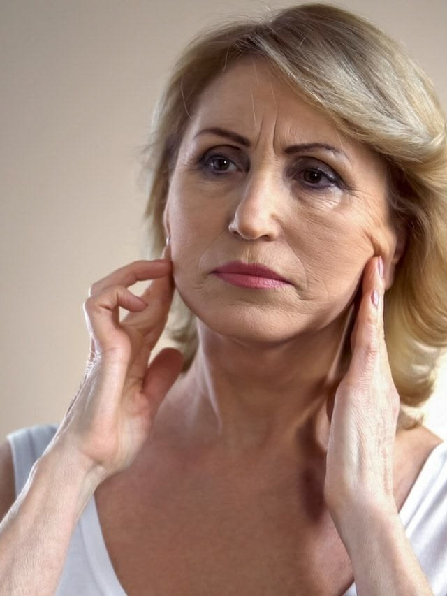 Close-up of neck and jawline area showing skin concern